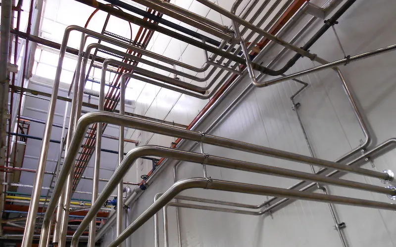 Sanitary stainless pipework in a processing plant